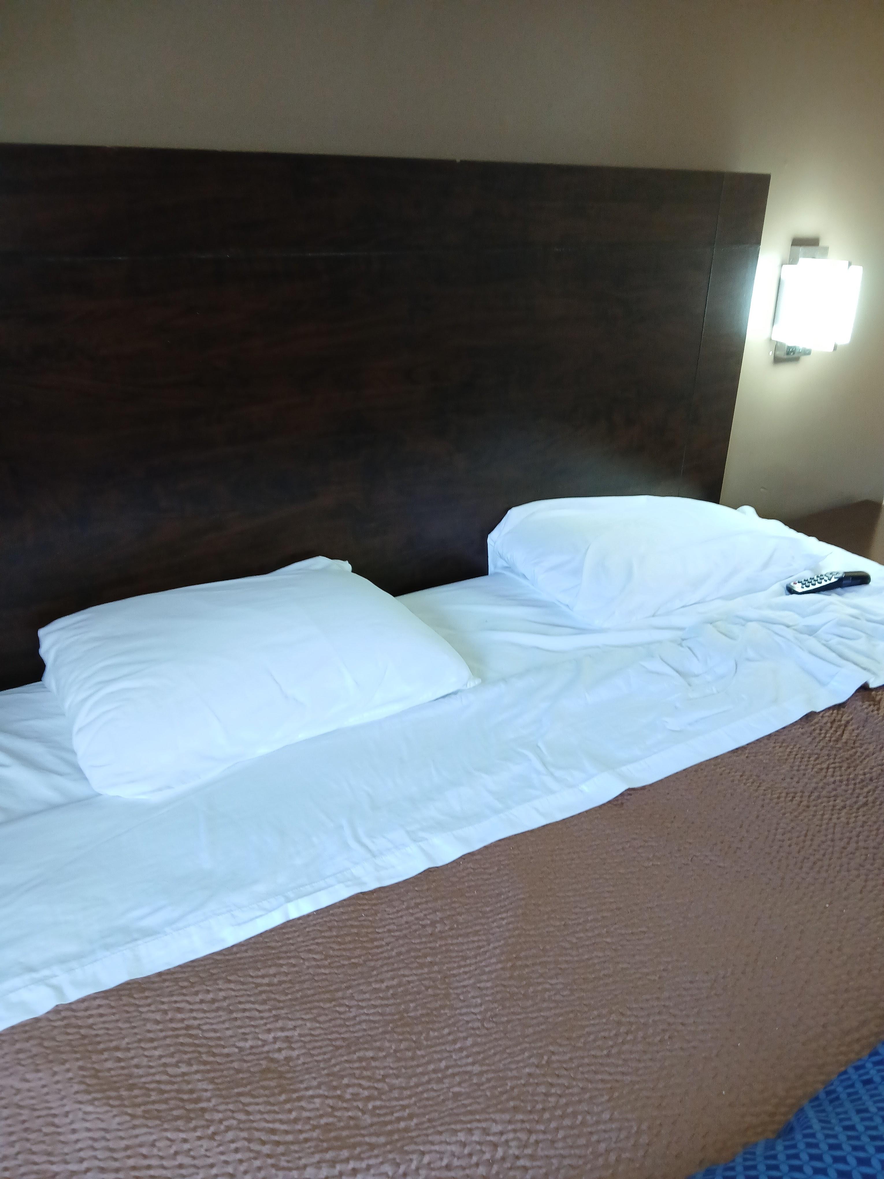 King bed with 2 standard pillows, not inviting!