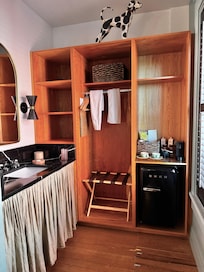 As mentioned, the only sink is in the kitchen area. There's none in the bathroom, so that bathroom door is going to be unsanitary, for sure.