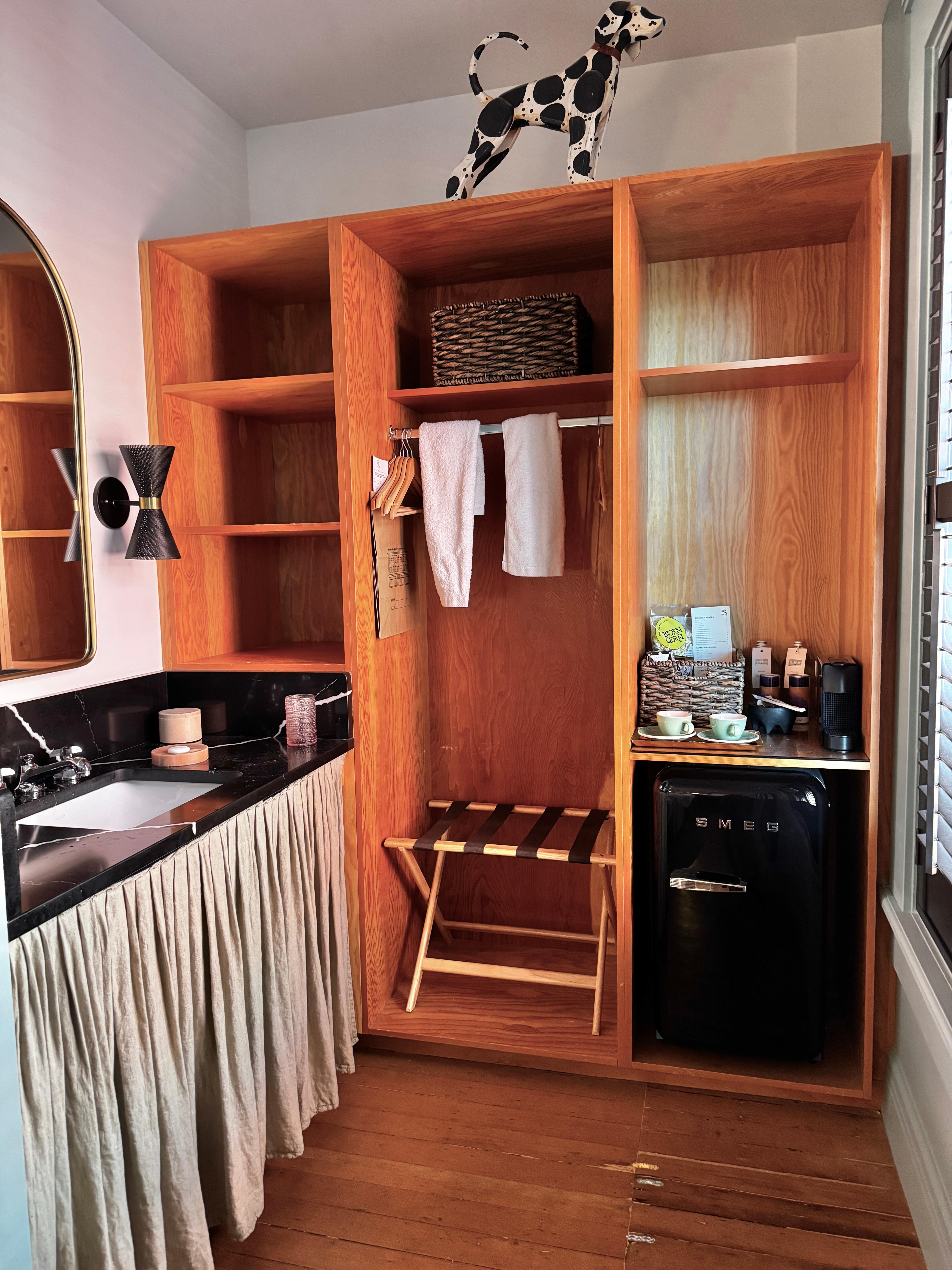 As mentioned, the only sink is in the kitchen area. There's none in the bathroom, so that bathroom door is going to be unsanitary, for sure.