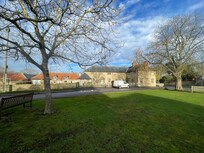 A view of some of the cottages/rooms from outside