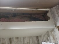 There's the hole in the wall behind the door