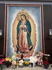 Our Lady of Guadalupe a stunning 10-by-7-foot mosaic created by the internationally renowned studio of Lenarduzzi Valerio Mosaics the Italian artis. Took about nine months to complete the artwork of more than 55,000 tiles of gold and opaque glass.
