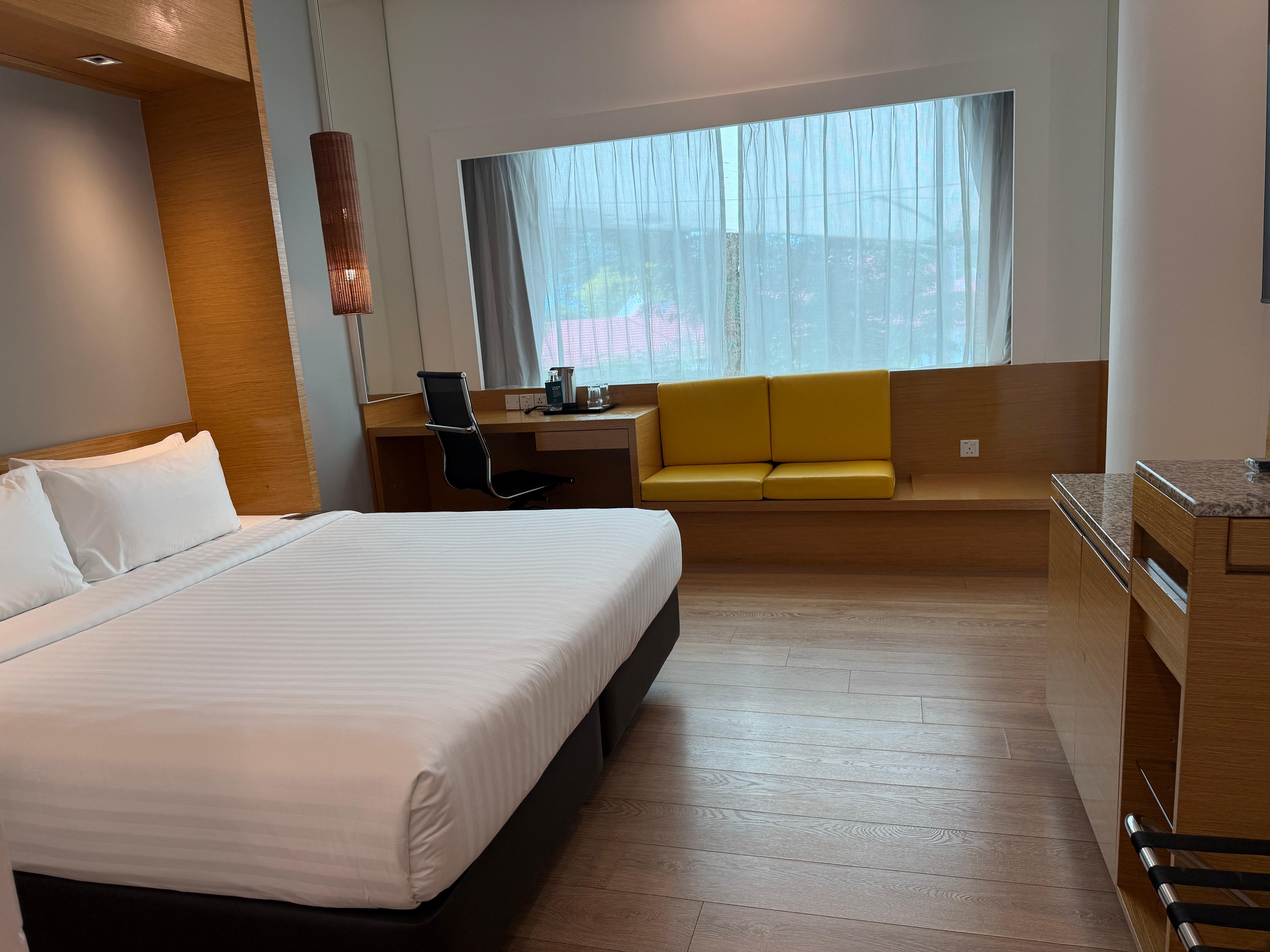 Bedroom showing bed with office desk and chair