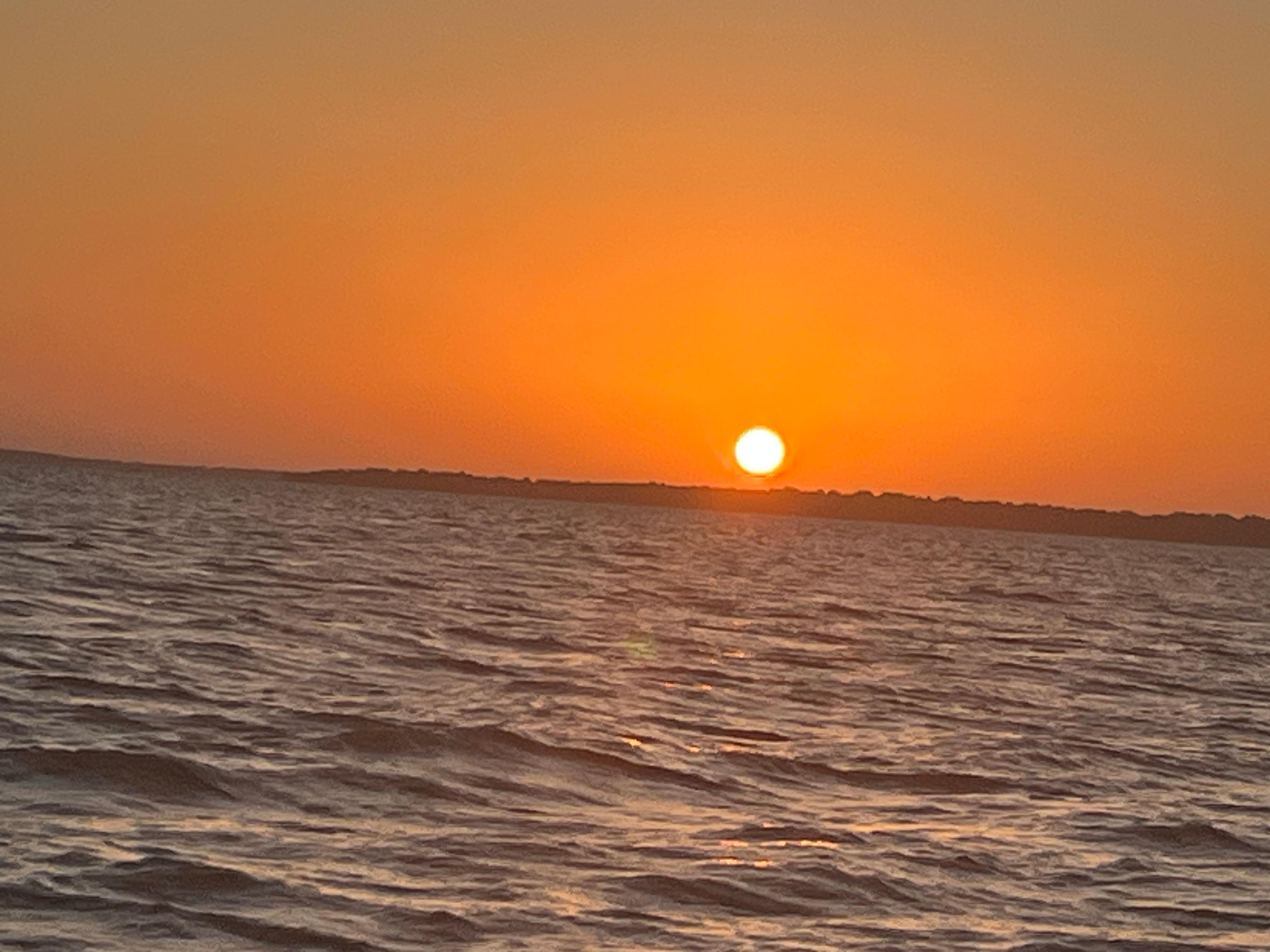 Sunset rise on the water