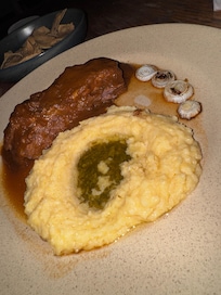 My beef brisket, it was just a big slab of fat. Mashed potatoes tasted like crunchy cream of wheat.