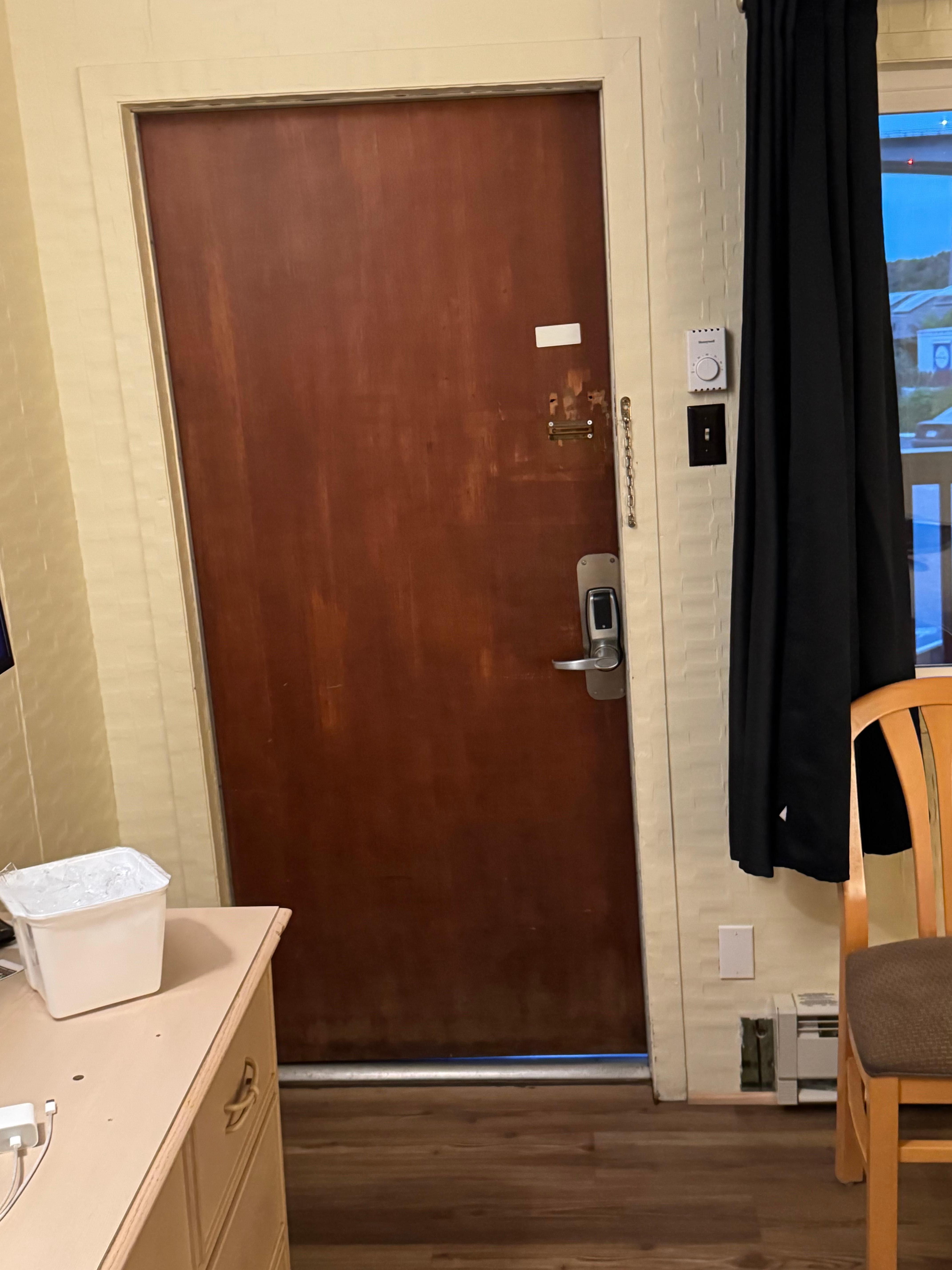 Door frame square door crooked, gap on right bottom of door
If you set a bottle on the floor, it would roll