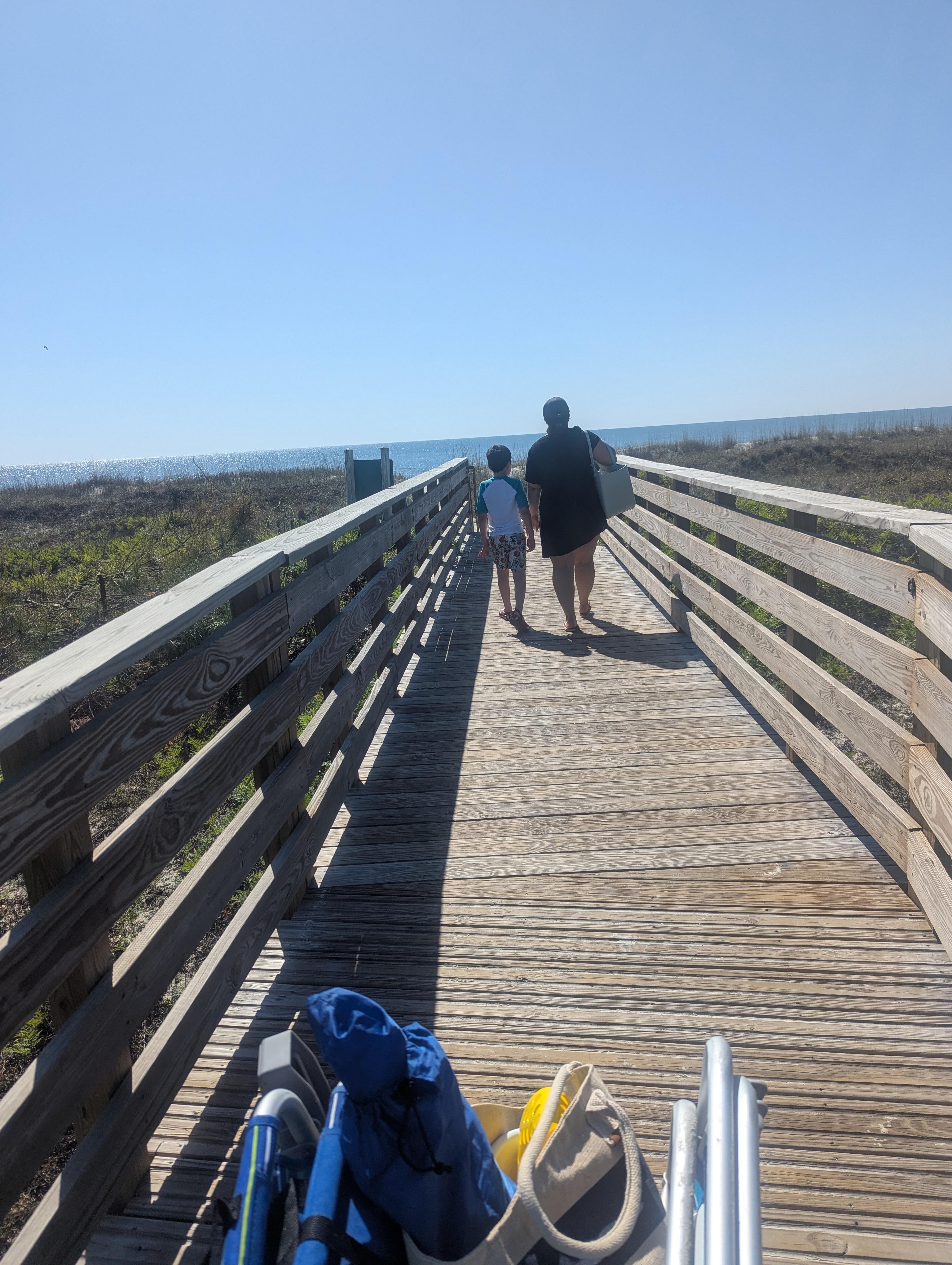 boardwalk to the beach from the property