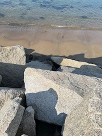 Steep rocks, where the stairs should be to access the beach