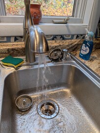 water spraying everywhere when you use the kitchen sink