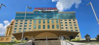 Great view of the front of hotel from an easily accessible and free parking lot.