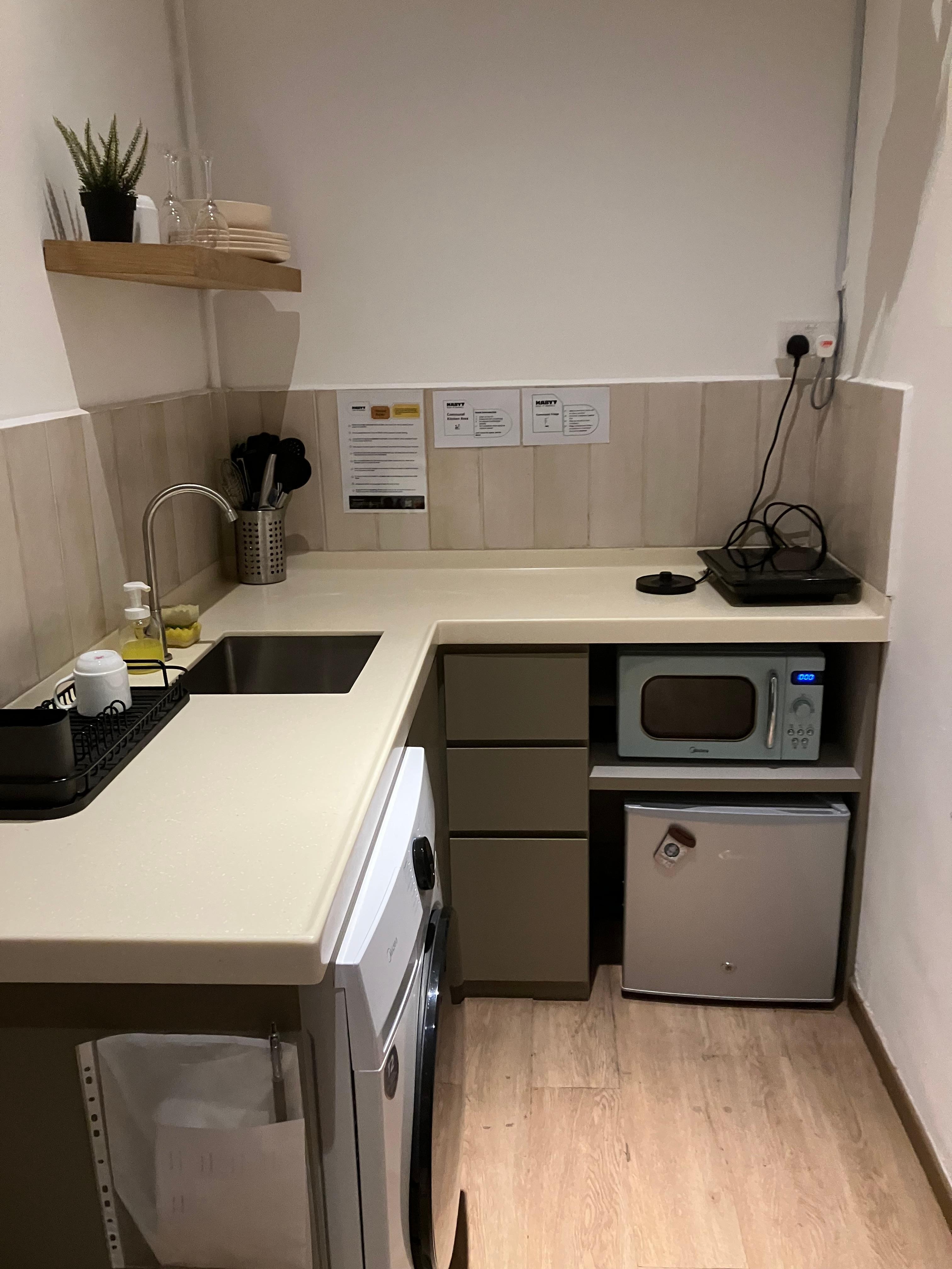 We never cook anything. Good size counter space. 
Smelled old musty when I opened door to go into our room.