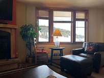 From the living room. The L shaped living room has two sitting areas.