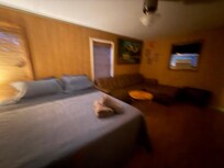 Master bedroom with enough room for a couple couches