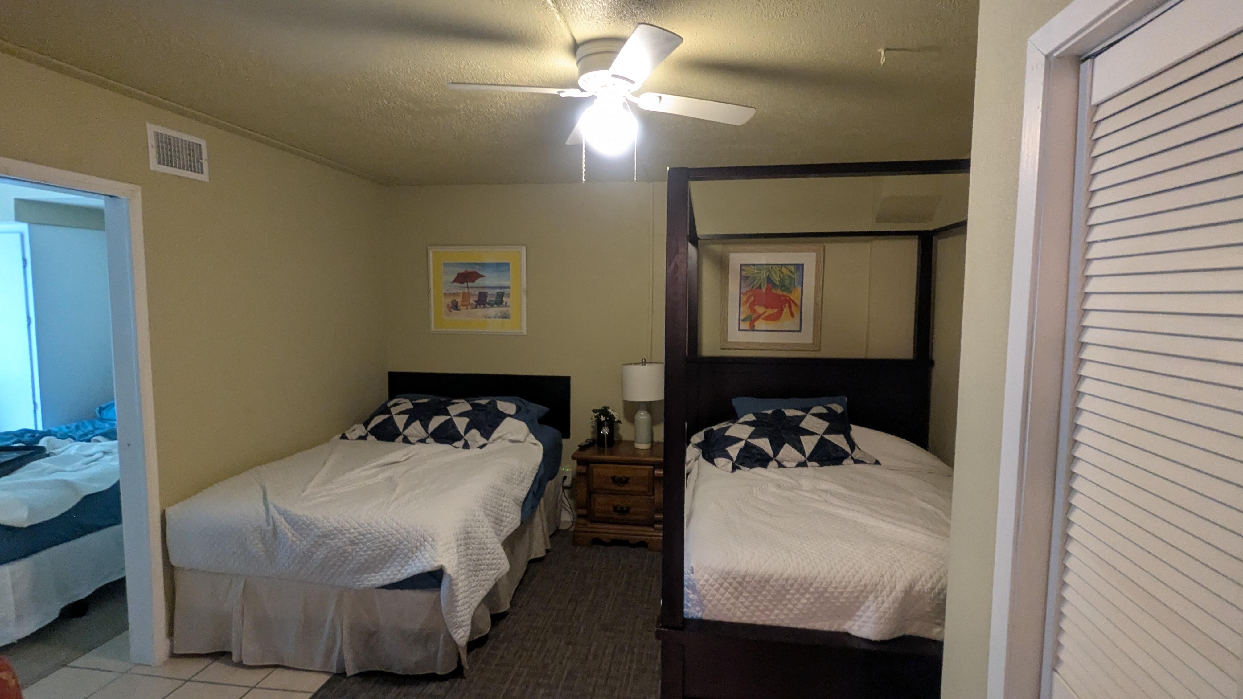 Rooms next to each other, stuck pocket door between