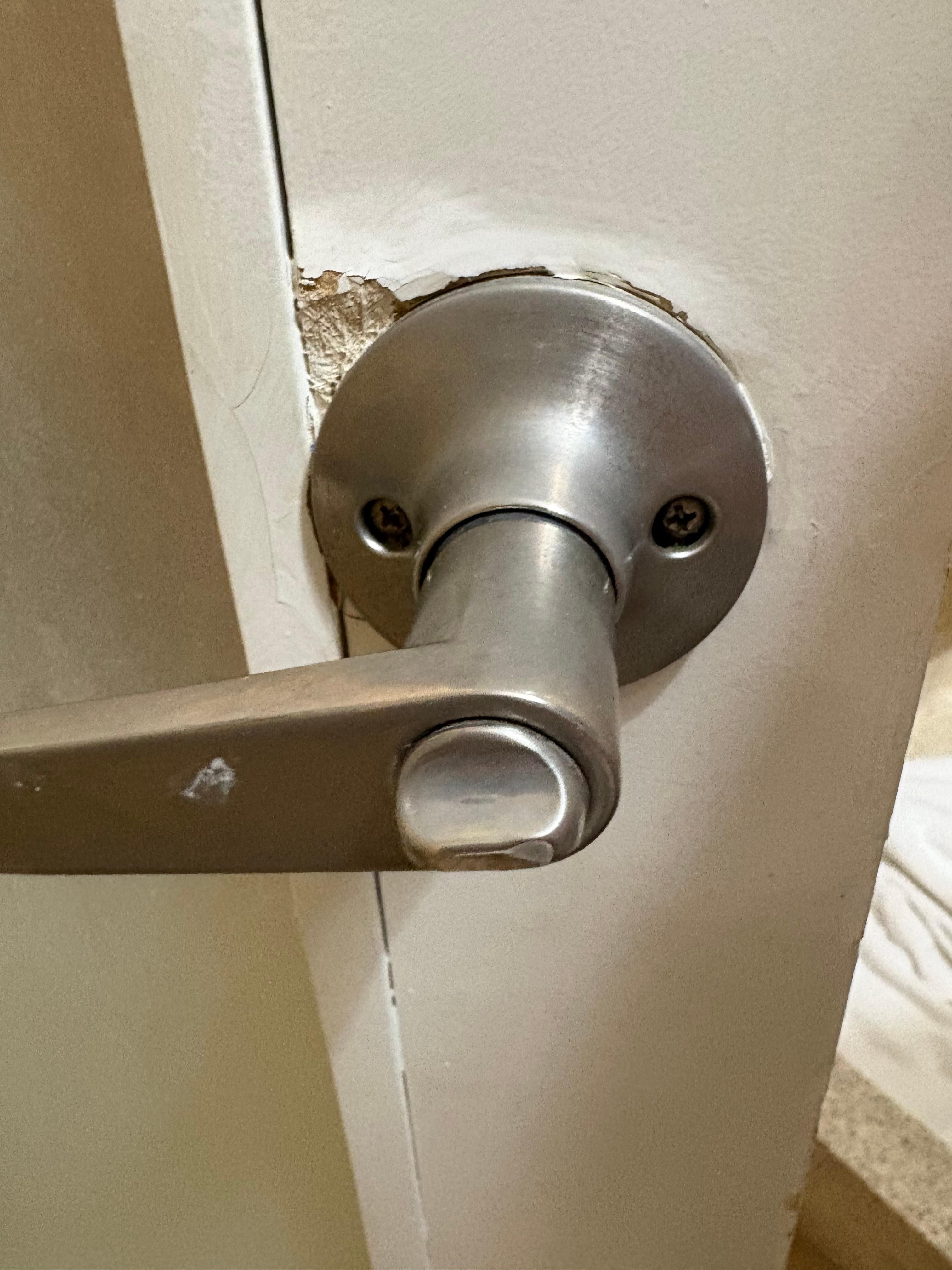 Damaged and painted over door 