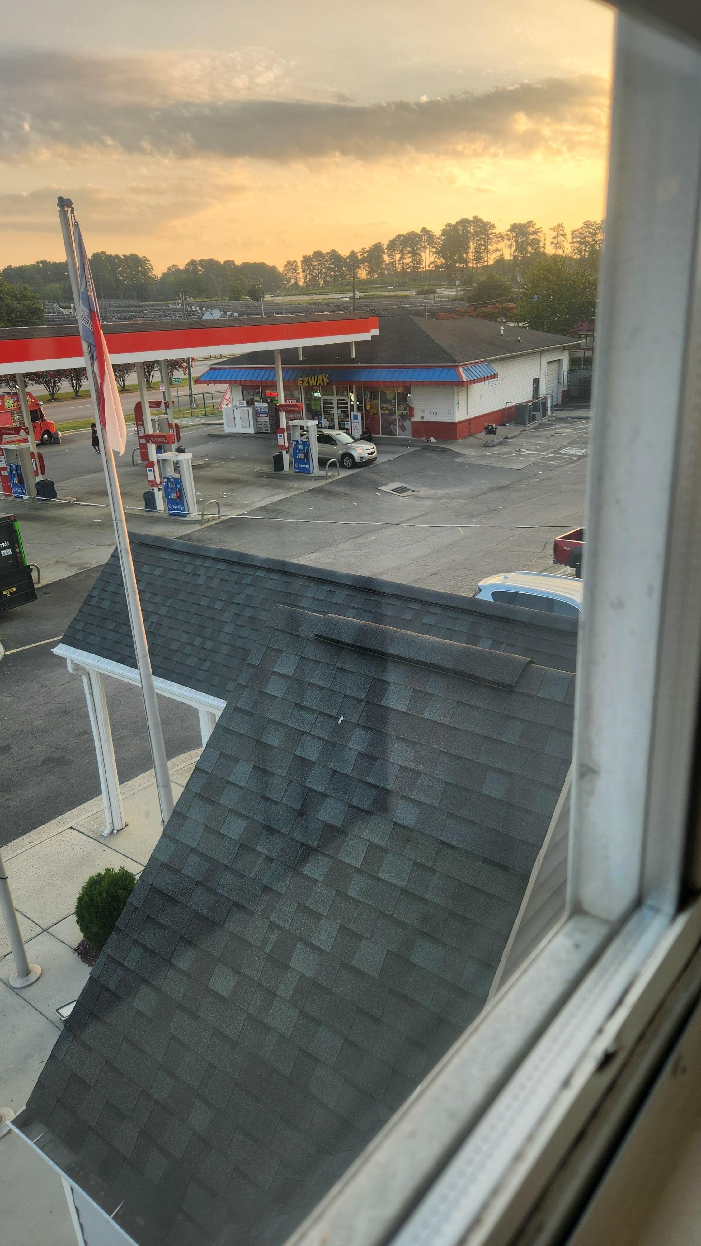 Gas station on either side of hotel 