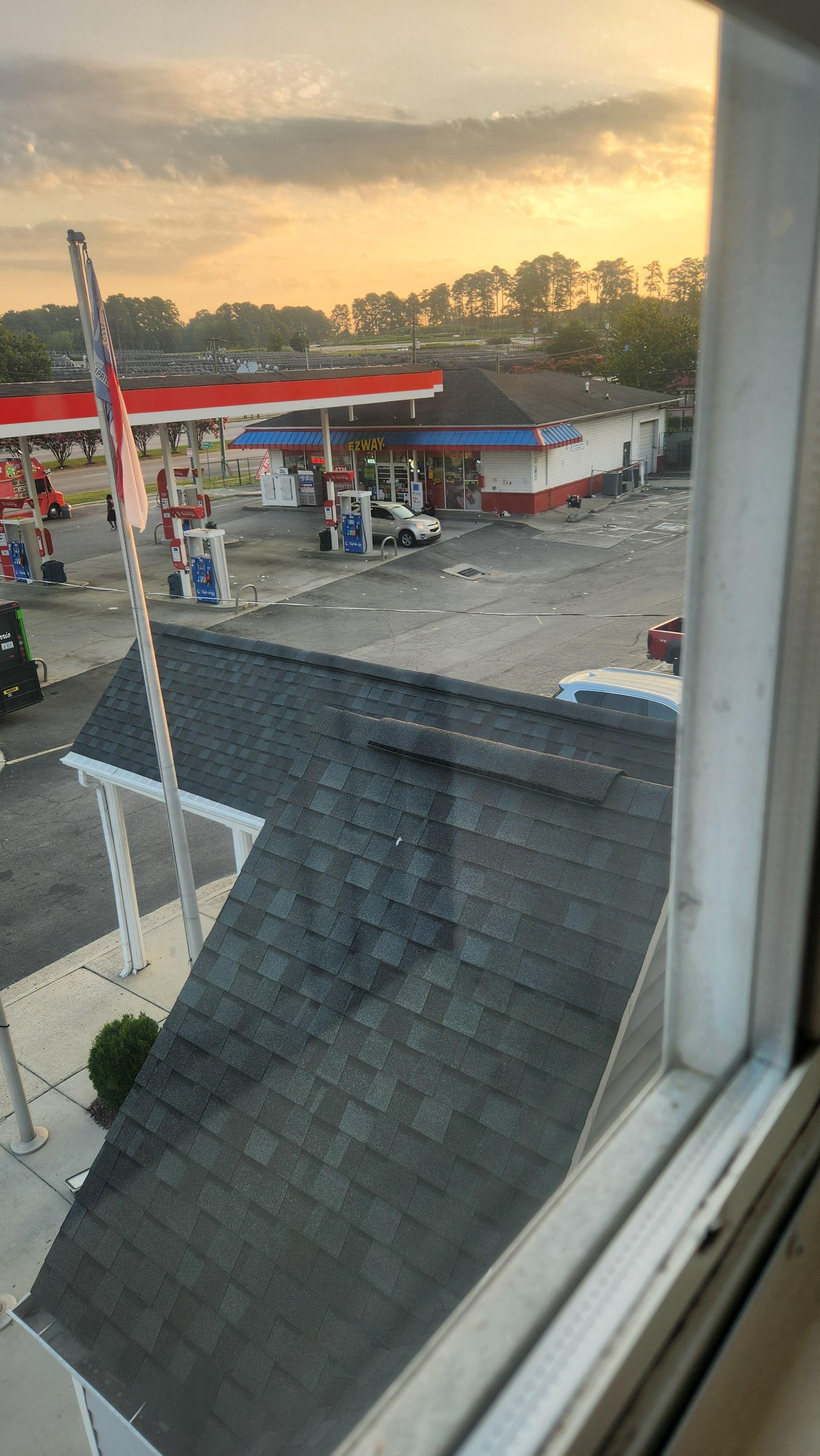 Gas station on either side of hotel 