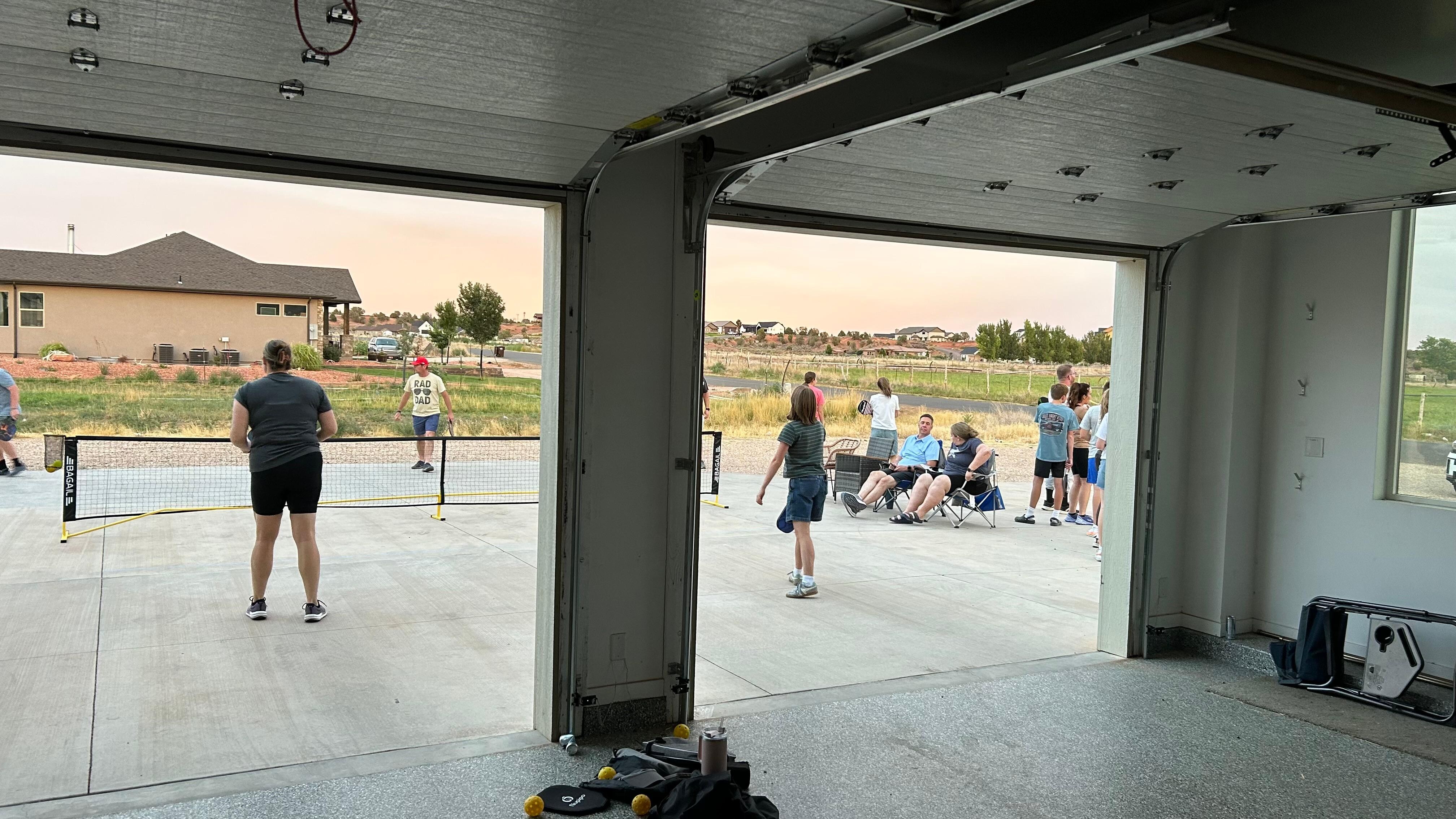 We brought a portable pickleball net and played in the driveway. 