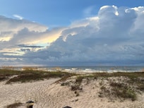 Tropical Storm moving west out of the area