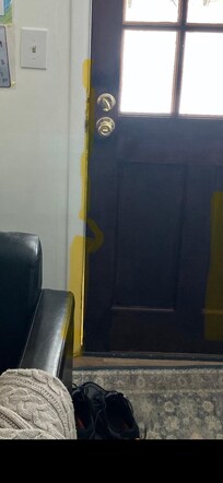 Wind blowing through around door . No seal