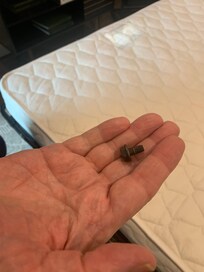 Bolt that was missing from side of couch found by my son but never notice it was missing by the maintenance man