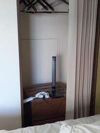 No outlet on one side of the bed, a huge inconvenience when sharing a bed. Space is so limited that the night stand was shoved inside the closet.