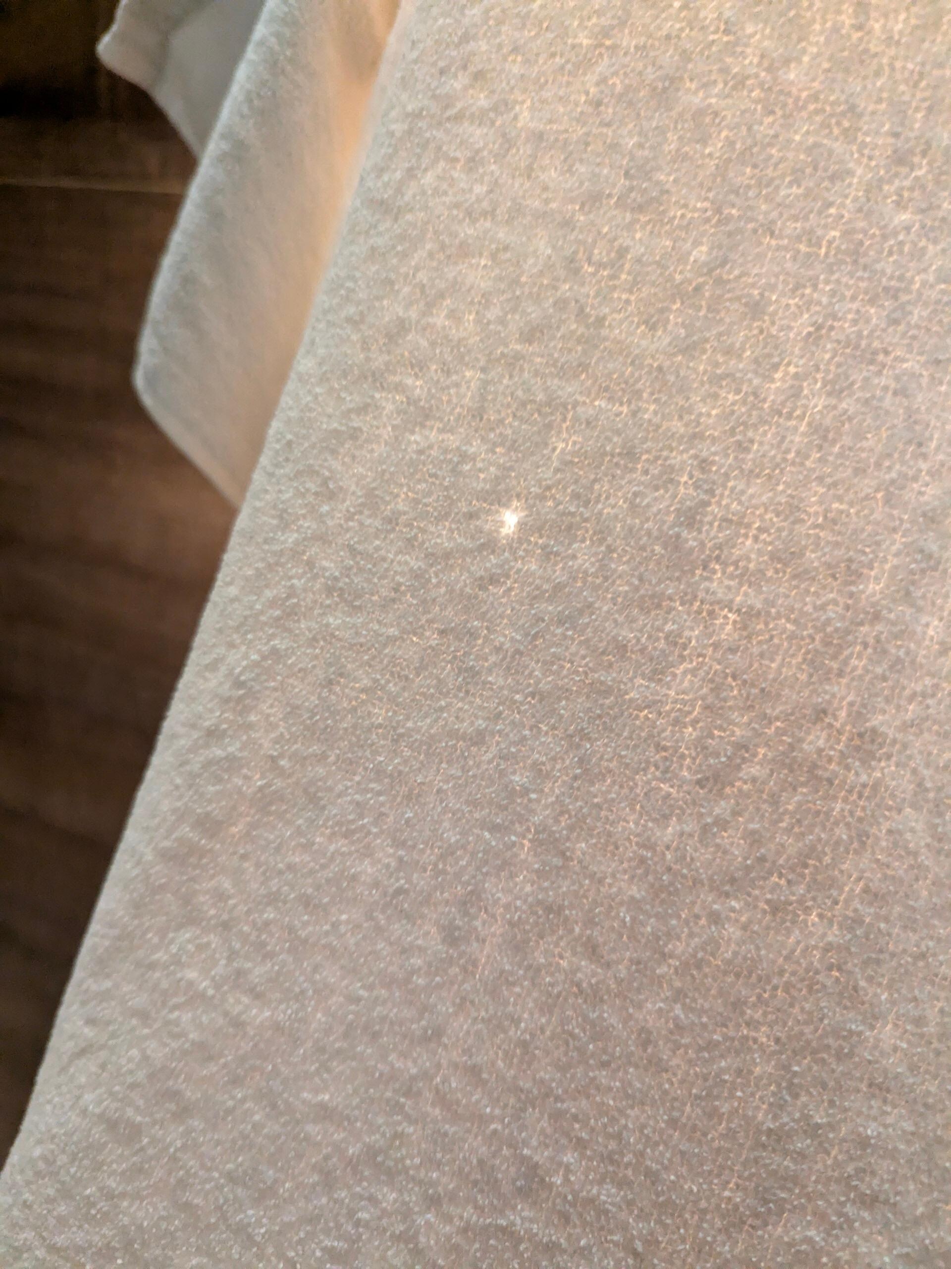 Hole in bath towel