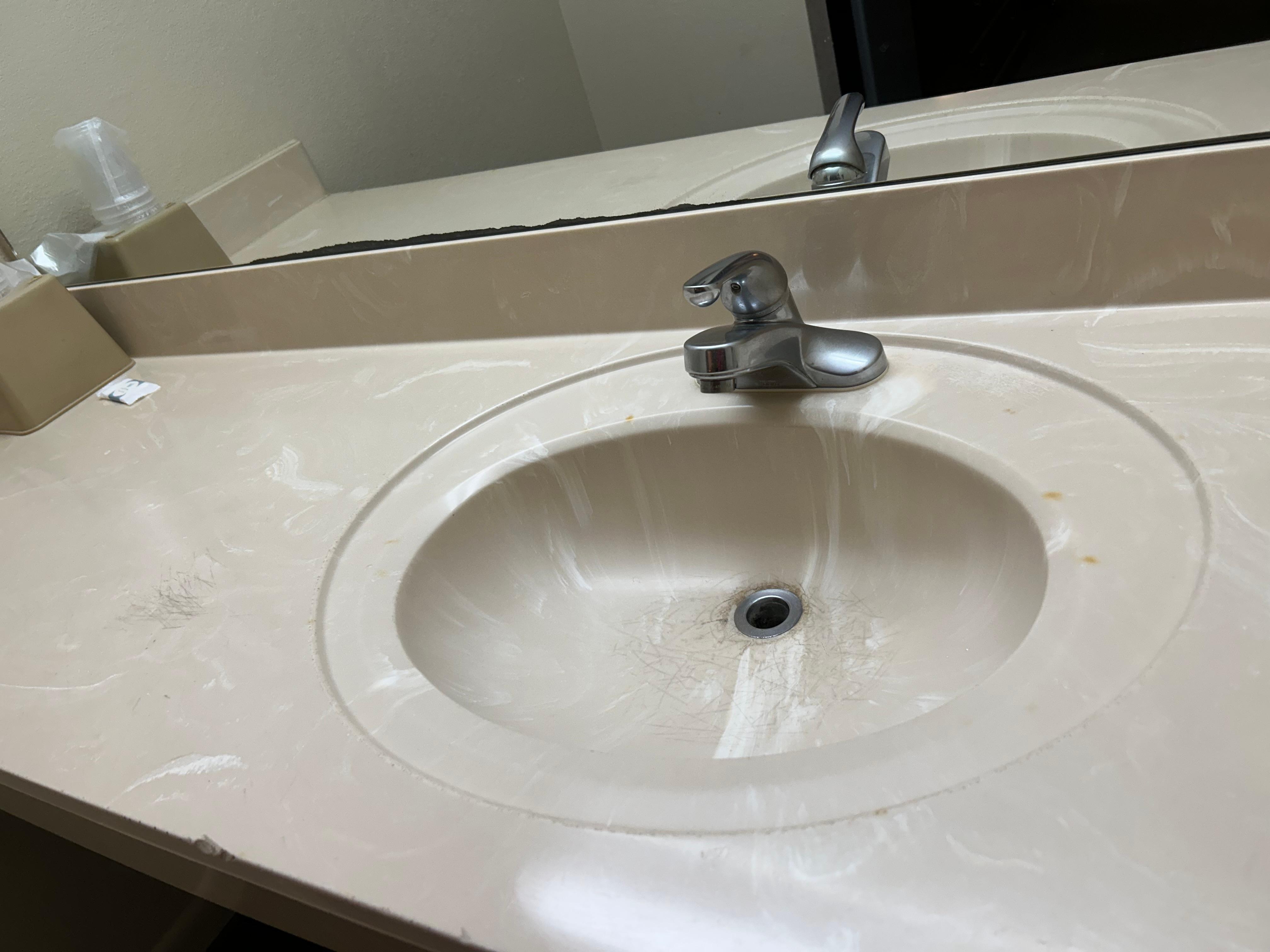 When you turn on the water, more water comes out at the base of the handle then out of the faucet