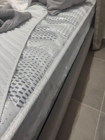 Thick packaging plastic on the beds making them got to sleep on and uncomfortable. It was sealed On both ends