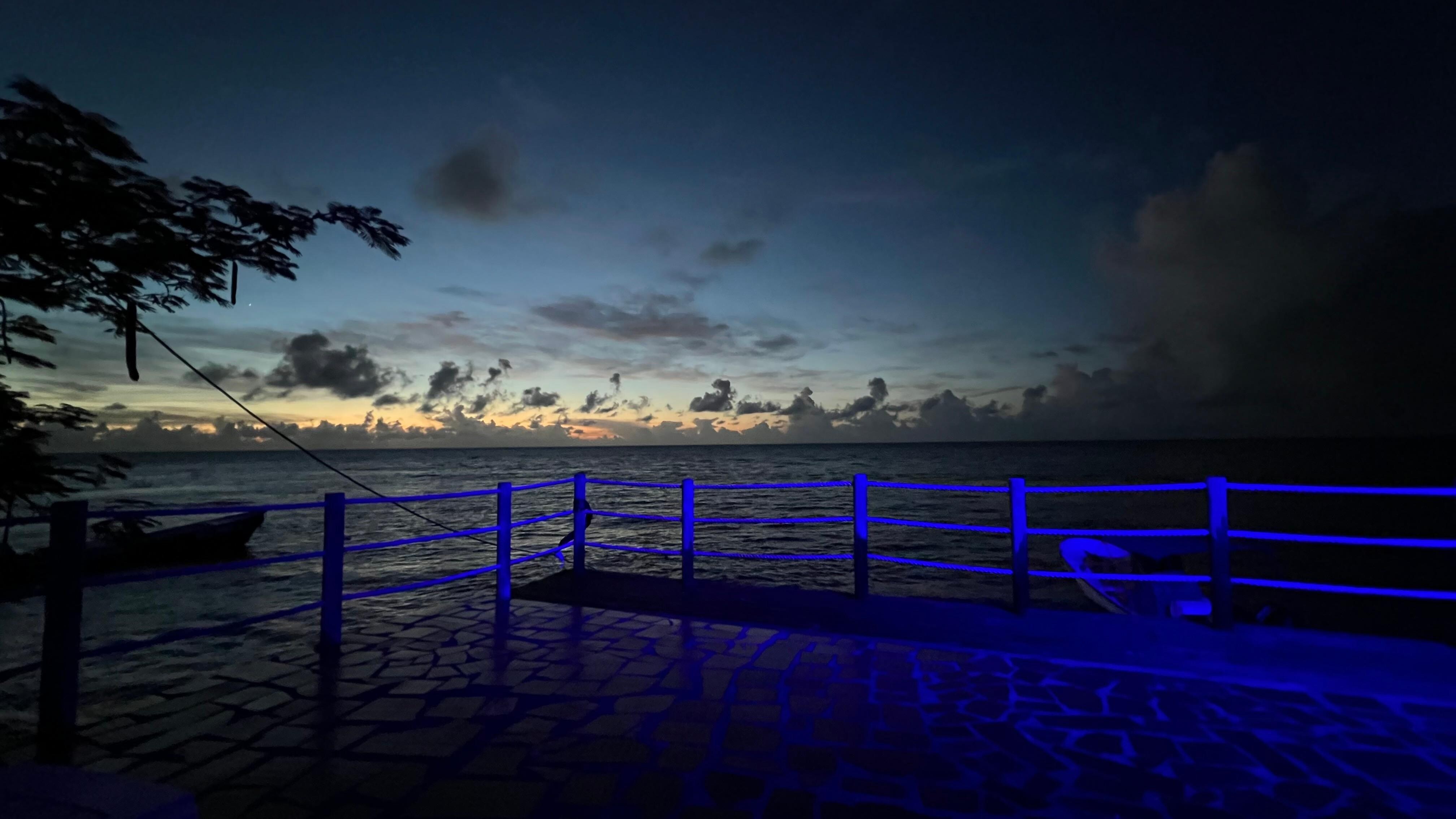 The deck at night, replete with mood lighting, hammocks and chairs.