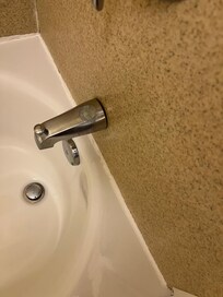 Stain on bathtub spout