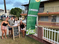 Woman near bye selling limbers