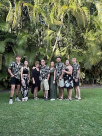 Family photo taken in the yard of the home