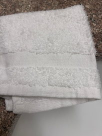 Hair on an unused towel.