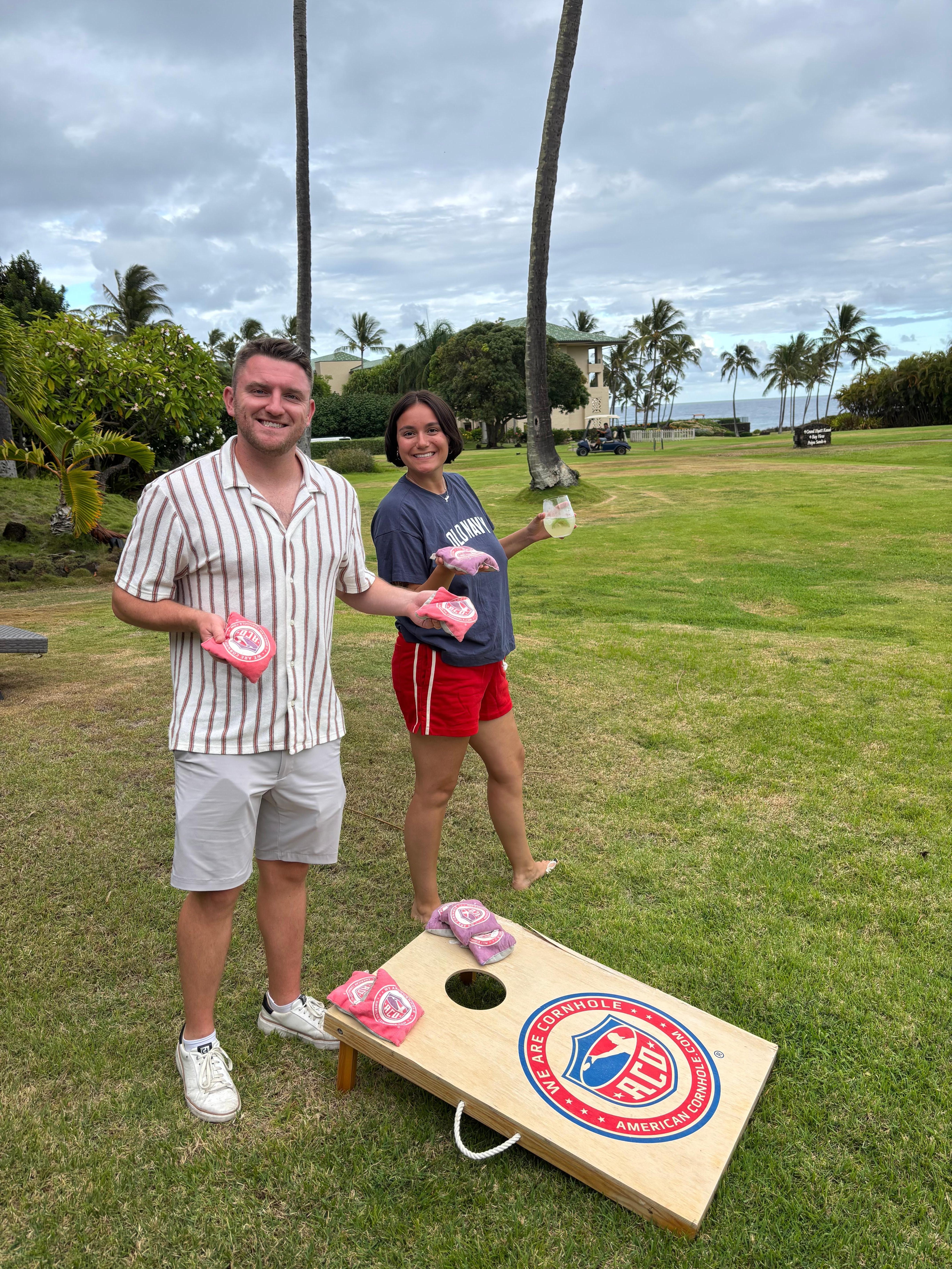 Playing cornhole in the “backyard”