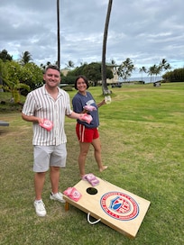 Playing cornhole in the “backyard”