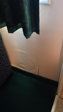 Peeling wallpaper in main area