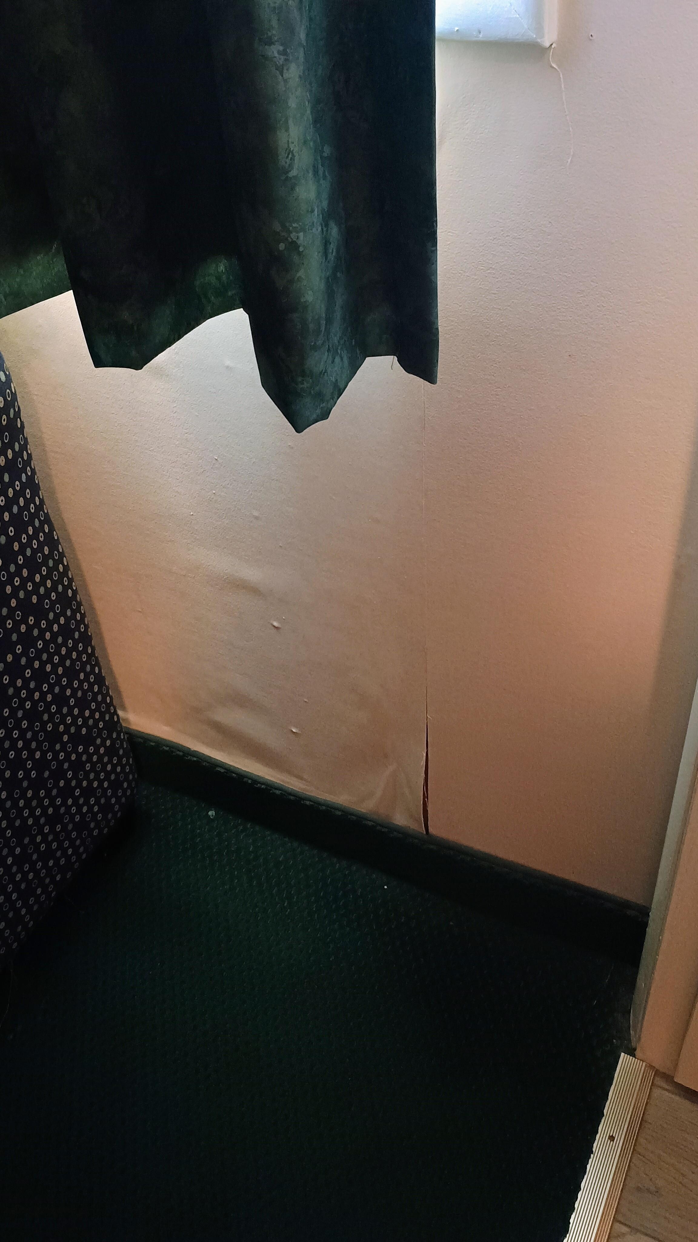 Peeling wallpaper in main area