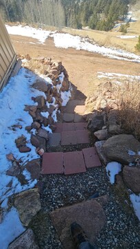 Beware of narrow steps and loose pavers.