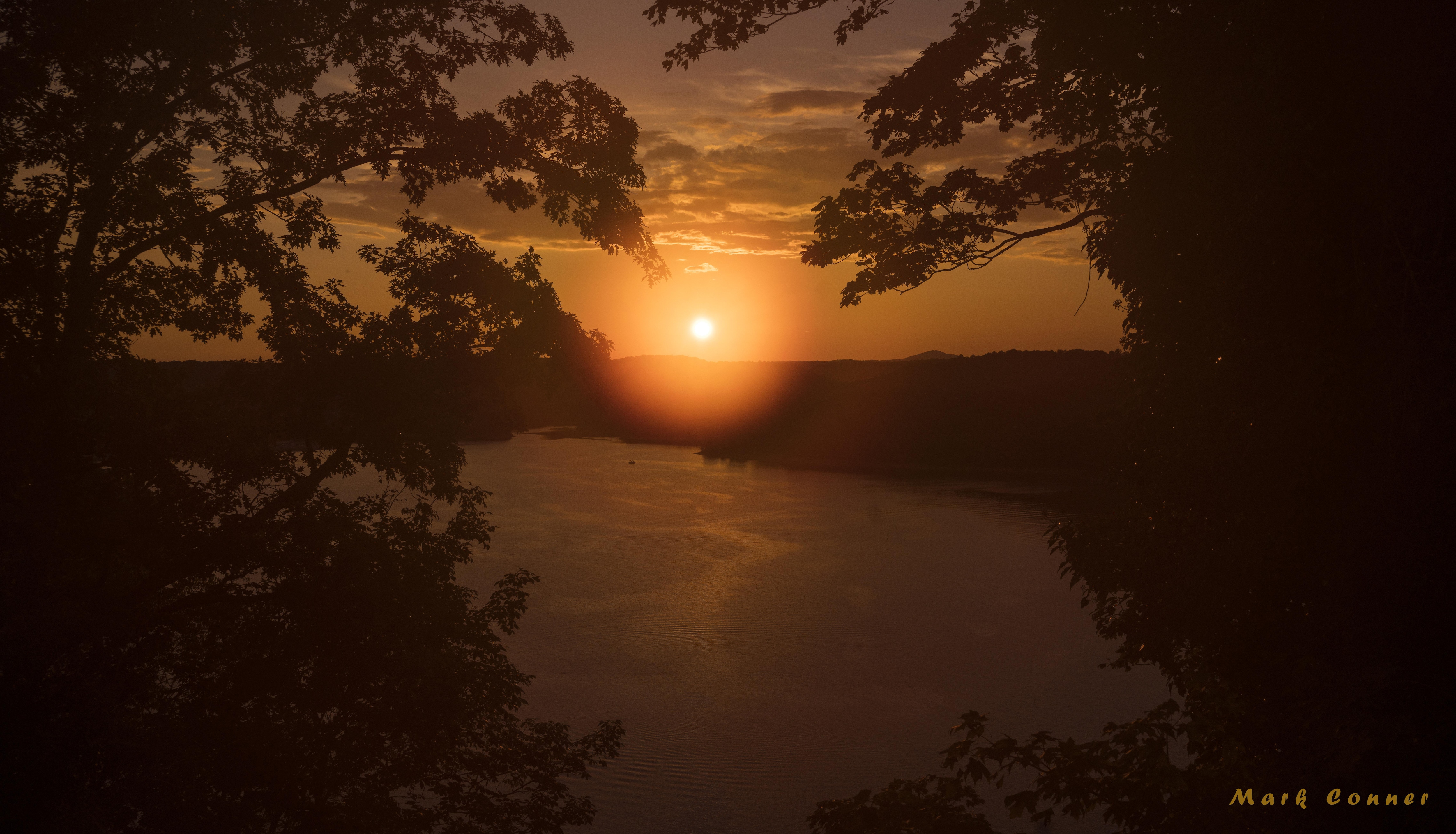 View of a Lake Cumberland sunset from the house deck.
