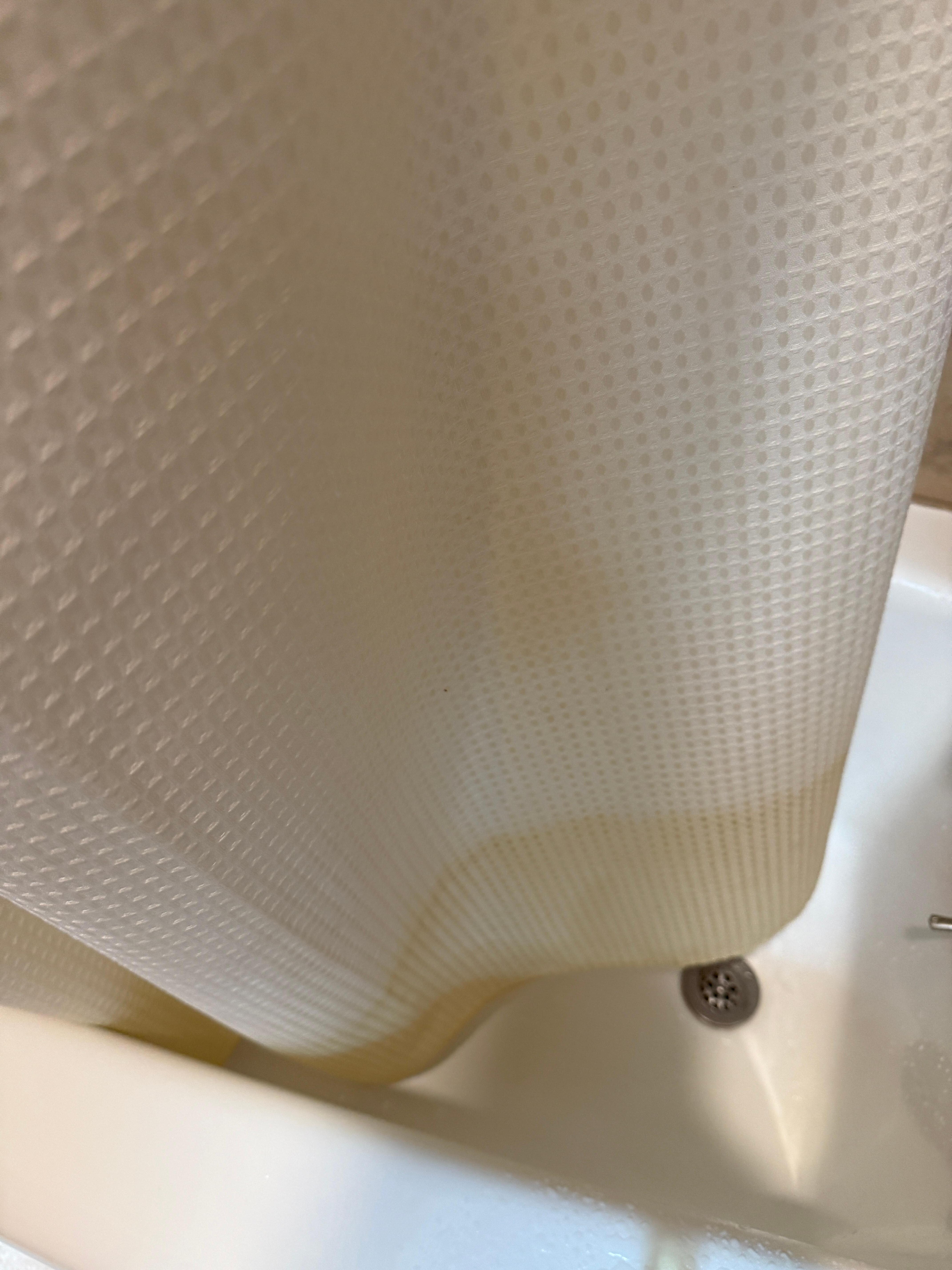 Shower curtain uncleaned / stained 