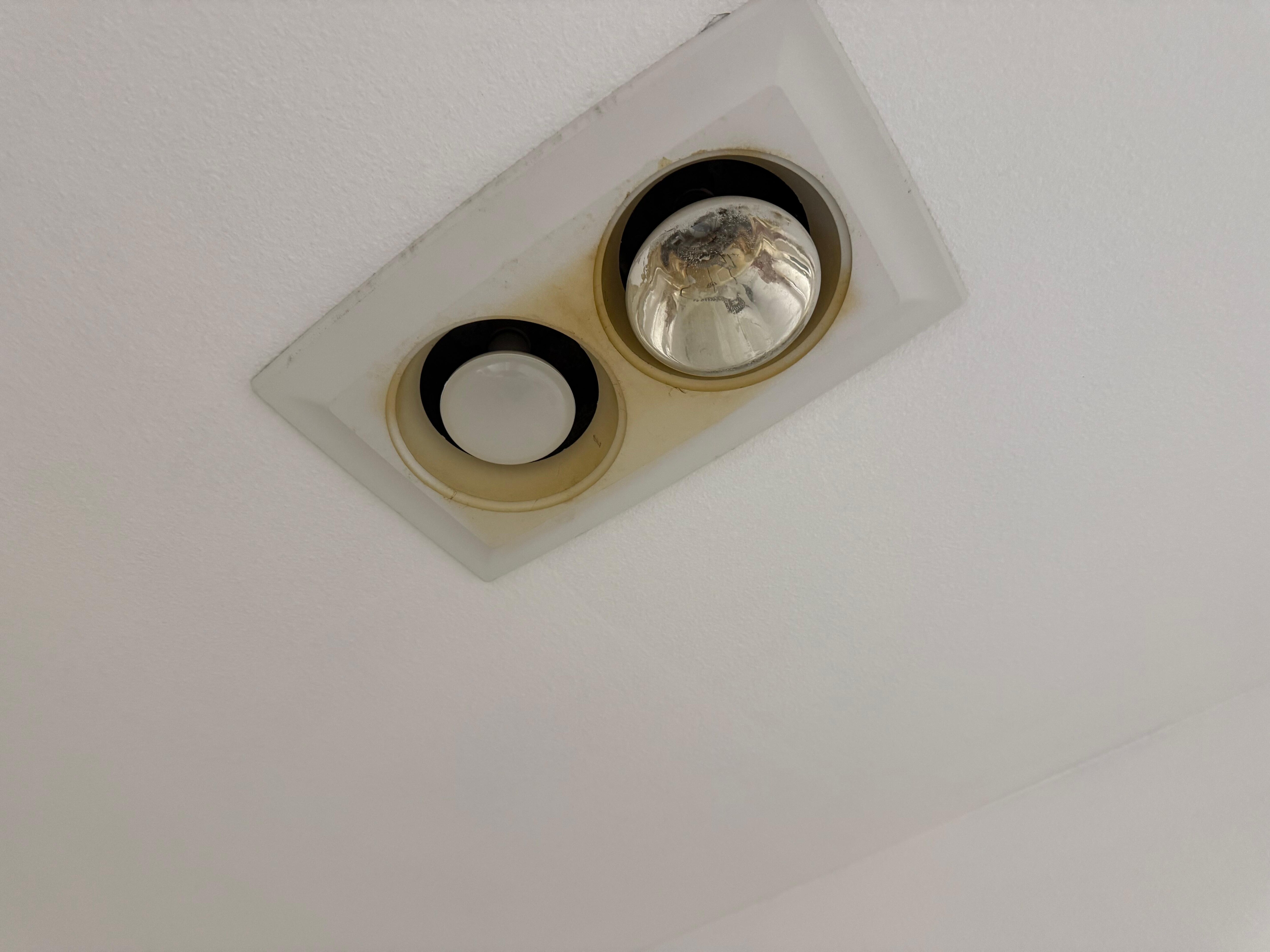 Heat lamps in bathroom dirty