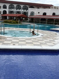 The pool is huge just the water is very cold and the hot tub is not a hot tub the water is room temperature