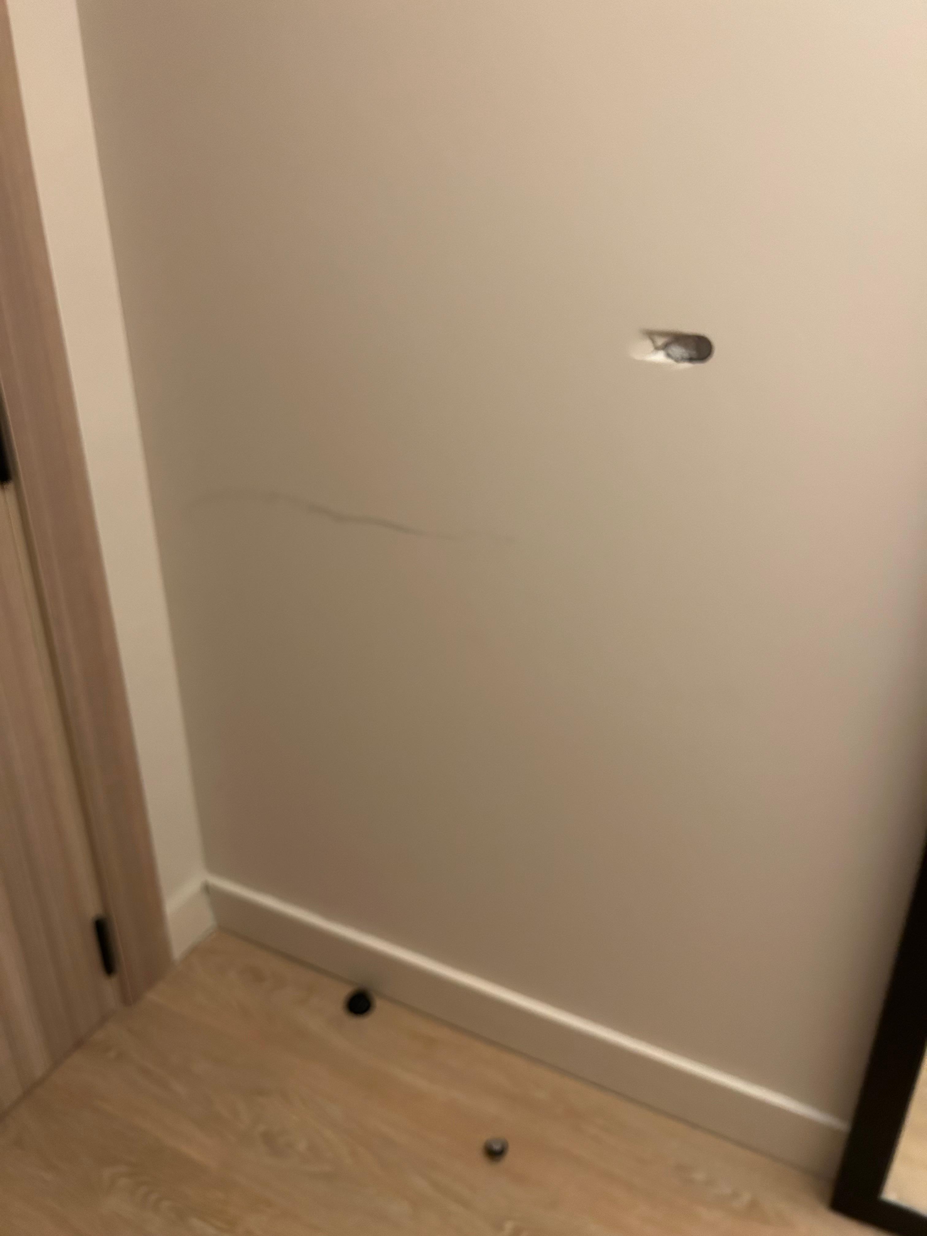 Hole in drywall in room that was not fixed.  Very low rent