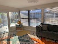 Sunroom 1 (looks out to pool area)