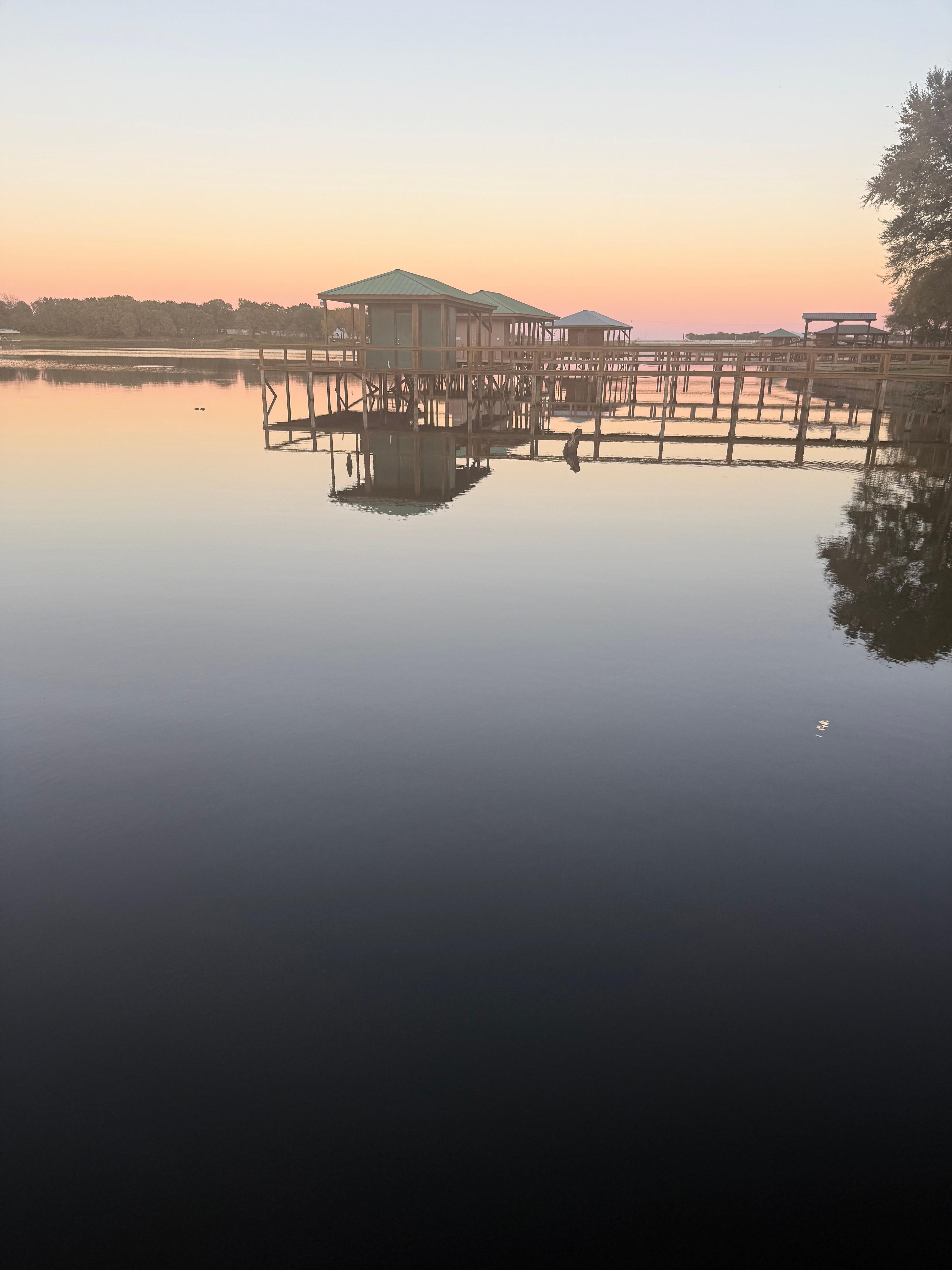 Beautiful sunset out by the boat dock and lake