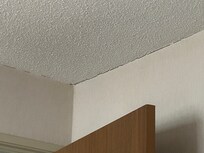 Ceiling and wall crack in Suite