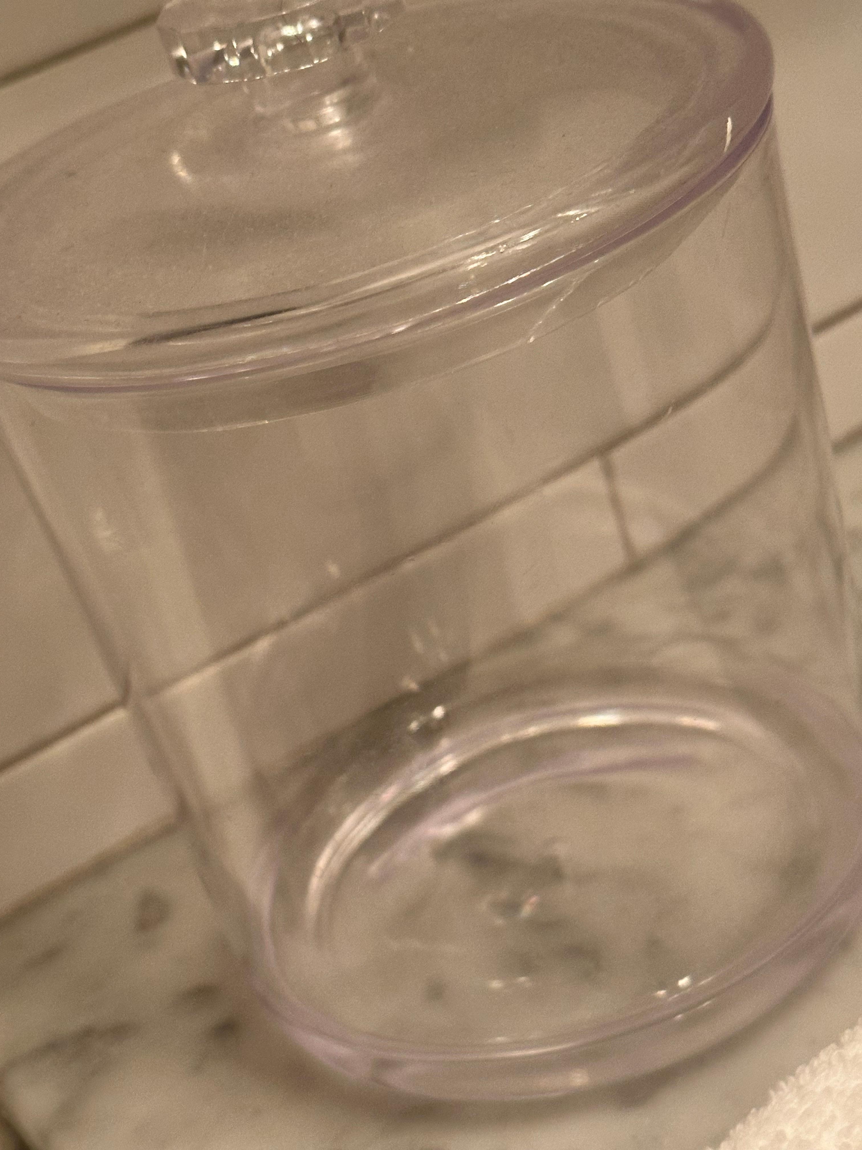 Empty cotton balls and q tip containers 