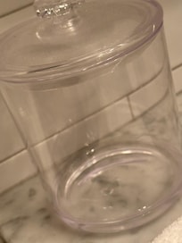 Empty cotton balls and q tip containers