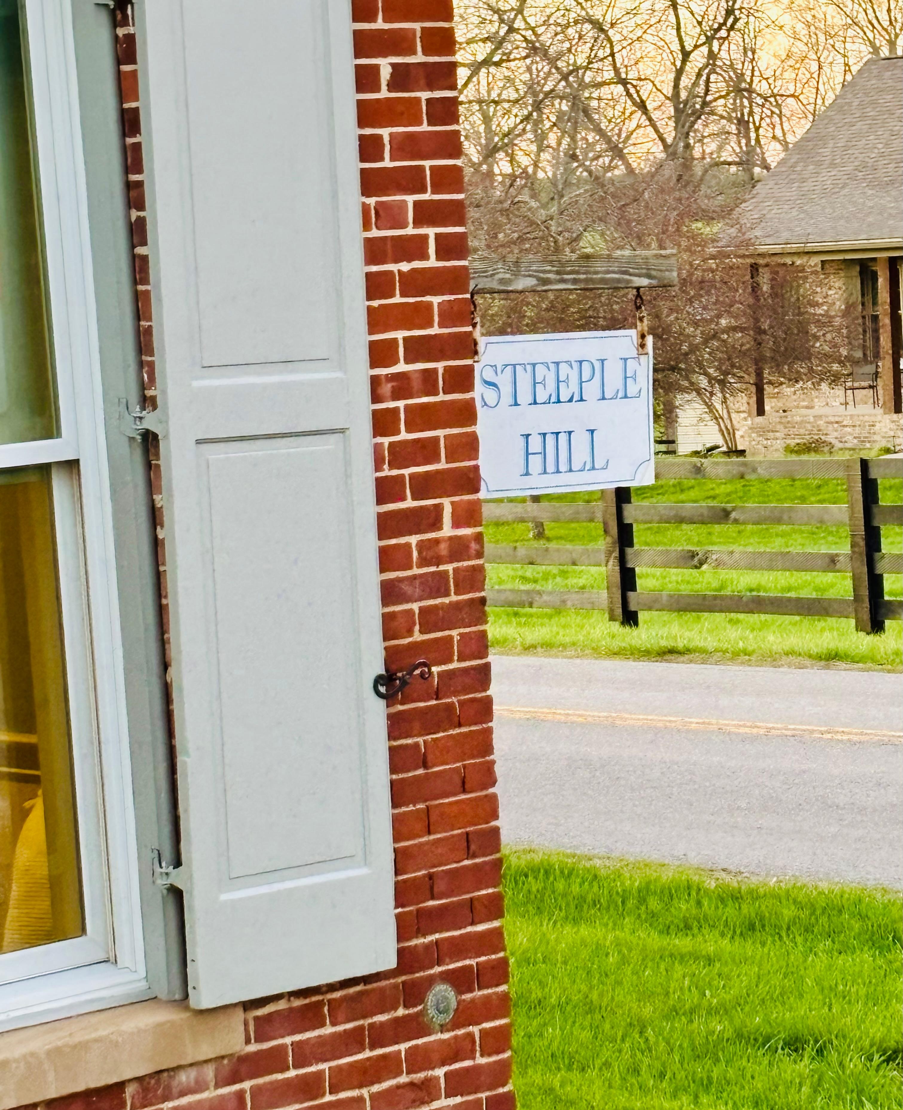 This is the sign on the edge of the building and we might not of driven past it the first time if we had known to look for it. 